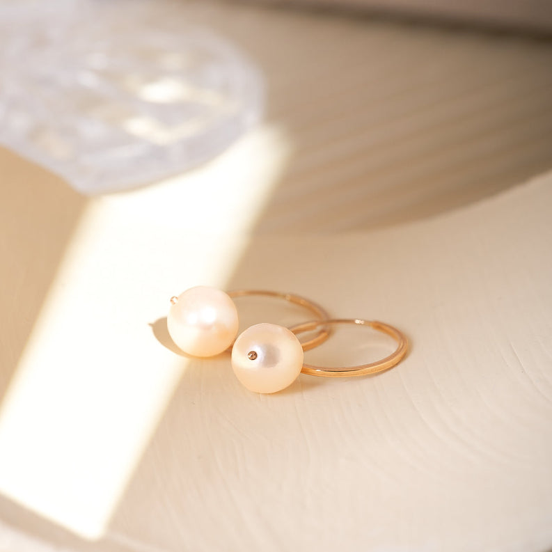 Perle pendenti - Orecchini eleganti e raffinati per un look sofisticato.
